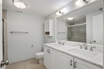 Ensuite master bath with double vanity and walk in shower